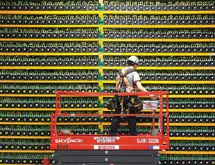 Bitcoin frenzy settles down as big players muscle into market