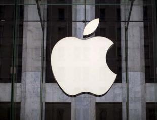 Apple surprises with iPhone sales, posts $100 bln buyback