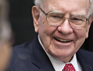 Buffett owns 5 percent of Apple, wants more