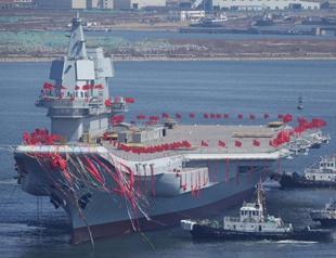 China’s first home-built carrier sets out for sea trials