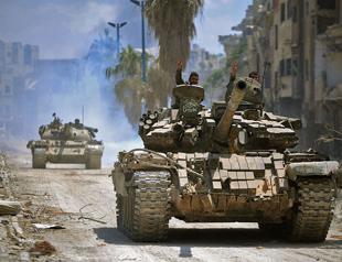 Syria regime advances in ISIL-held pocket of Damascus