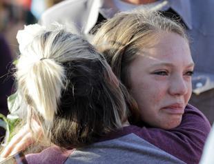 Police search for motive in Texas school shooting