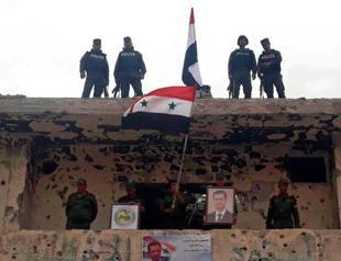 Syrian army, police celebrate recapturing all of Damascus