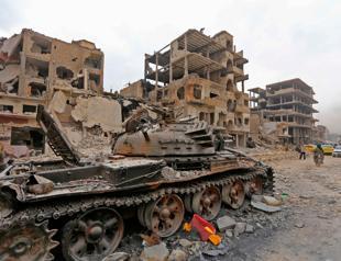 US-led strike on regime positions kills 12 in east Syria