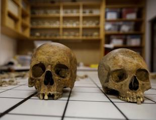 Sarcophagus with two skeletons and jewelry in ancient city