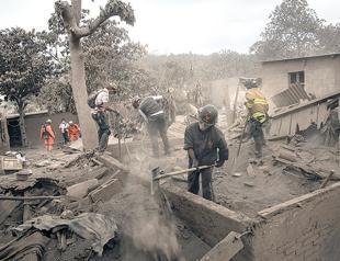 Guatemala warns of greater activity as toll climbs to 75