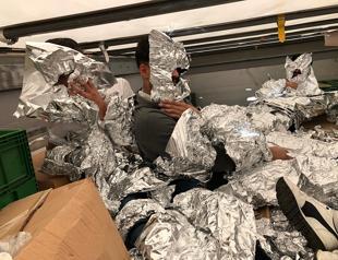 Undocumented migrants wrapped in aluminum foil caught on a truck in Istanbul