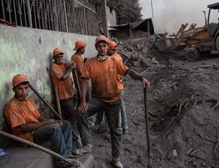Rescuers search for missing near Guatemala volcano as toll hits 99