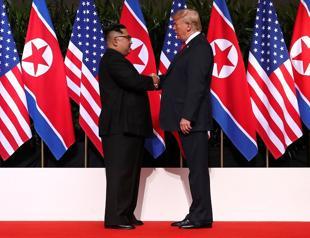 Trump, Kim sign comprehensive document