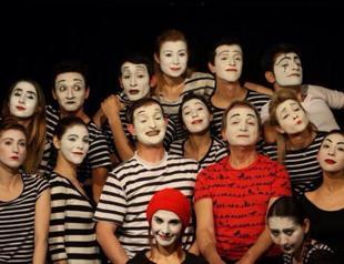 Turkish students graduate in mime as university shuts down department