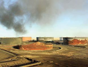 Attack shuts Libyan oil ports, slashes production