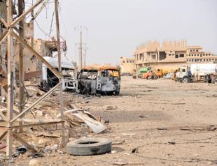 Syria says US-led strike hits troops in east, US denies