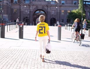 Swedish minister supports Turkish-origin footballer by wearing his jersey
