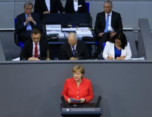 Merkel warns Trump against trade war