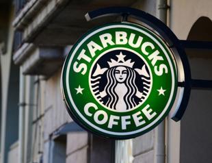 Nestle seals deal to market Starbucks coffee