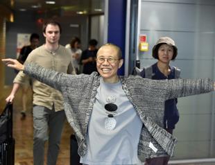 Hong Kong activists celebrate after Liu Xia leaves China
