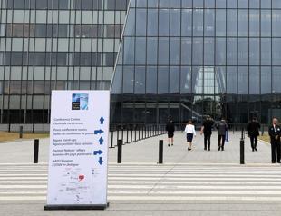 Turkey takes heavy agenda to NATO summit