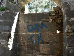 Vandals spray paint historic Side artifacts