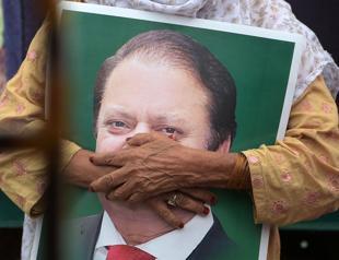Pakistan ex-PM Sharif heads home to face jail before polls