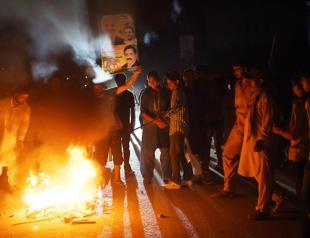 Sharif in custody as 132 die in Pakistan election violence