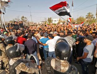 Two killed in southern Iraq as protests spread