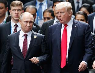 Trump and Putin take to summit stage