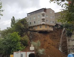 Building in Istanbul collapses after landslide takes away foundation