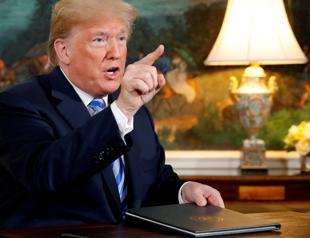 Trump warns world against business with Iran as sanctions return