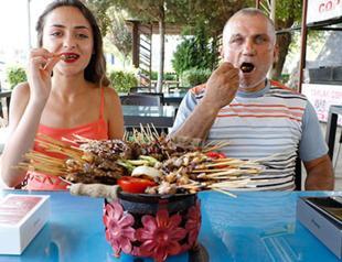 Toothless man breaks shish kebab eating record