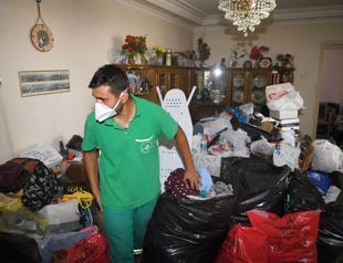 10 trucks of garbage collected from old woman’s apartment