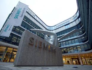 Siemens denies report it may cut 20,000 jobs