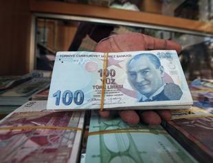 Fitch says lira depreciation heightens risks for Turkish banks