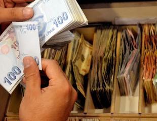 Turkey lowers withholding tax on lira deposits, raises tax on forex deposits