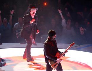 Bono says back to full voice, U2 tour will resume