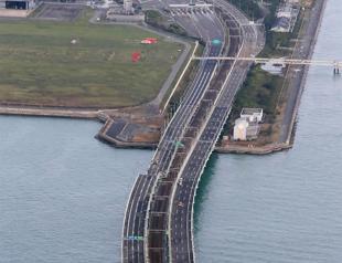 Powerful typhoon kills 9, shutters airport in Japan
