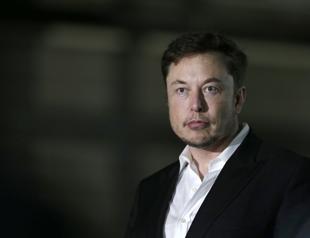 Tesla tumbles on new executive departures, Musk interview