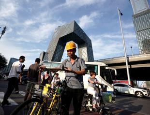 China economy shows weakness as investment growth hits new low