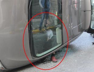 Turkish man gets stuck in car in odd position after accident