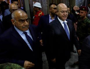 Iraq names new president and premier, ending deadlock