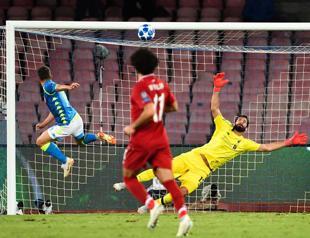 Liverpool seek to regain title momentum as Man City visit