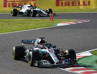 Hamilton wins in Japan, Vettel sixth