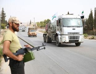 Syria buffer free of heavy arms as jihadists face deadline