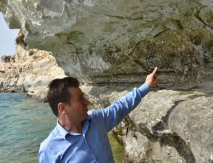 Paleolithic art unveiled after dam water ebbs