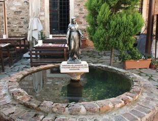 Coins tossed into Virgin Mary pond prompt tax probe in Turkey’s west
