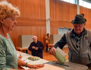 Merkel government shaken by regional vote battering