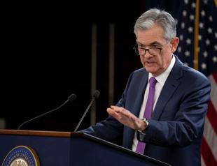 Fed’s Powell sees potential threats from global slowdown