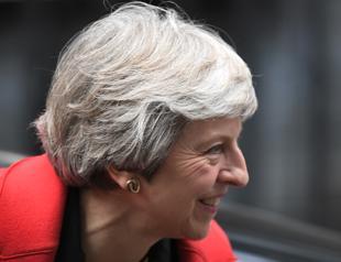 UK’s May battles to save her Brexit deal and her job