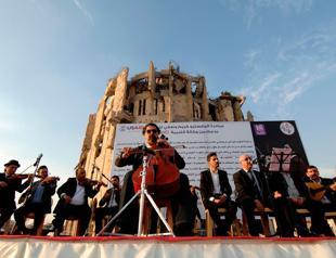 After years of silence, music fills streets of Iraq’s Mosul