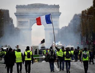 French police fire tear gas at fuel price protesters