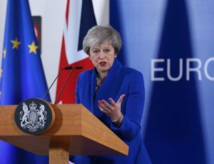 EU seals Brexit deal as May faces a hard sell at home